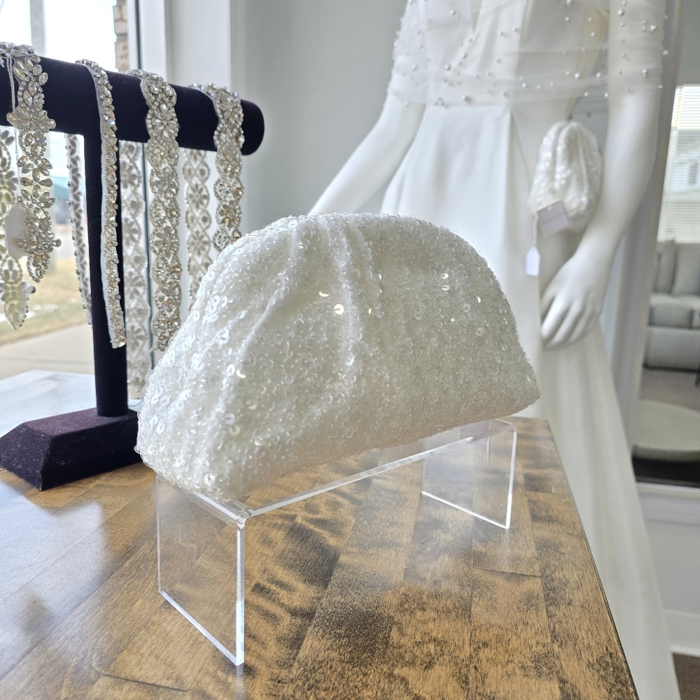 Elegant White Textured Clutch with Intricate Design
